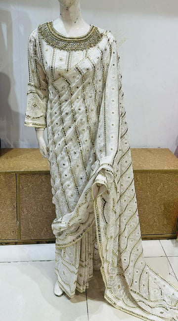Chiken kari saree with 7 mm Sitara and handworked neckline Stitched with petty coat